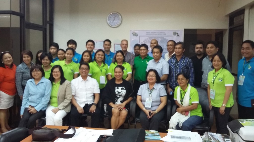 WB Task Team Leader Carolina Geron (seated 4th from left), DA-PRDP National DPD Arnel De Mesa (seated 3rd from left), PSO Visayas Deputy Director Tess Solis (seated 2nd from left)and other WB and DA-PRDP staff visit the Provincial Project Management and Implementing Unit of Negros Occidental during the First WB Review Mission in Visayas from January 21-23, 2015.