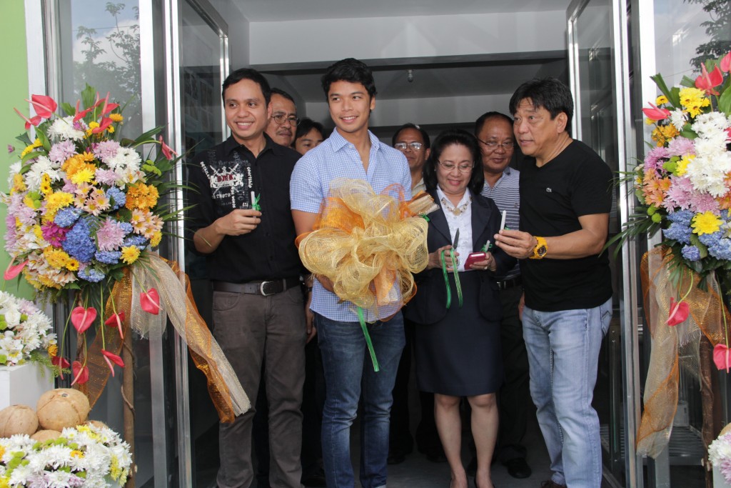 DA Secretary Proceso J. Alcala (rightmost), assisted by Camarines Sur Governor Miguel Luis R. Villafuerte, PRDP PSO Luzon B Director Shandy M. Hubilla, DA Resident Auditor Edith Aguilar and DA RFO V RED Abelardo R. Bragas, leads the ribbon-cutting ceremony during the blessing and inauguration of the Coco Water Processing Technology Pilot Testing and Business Incubation Facility on February 11, 2015 at the DA-RTCC BIARC Compound in San Agustin Pili, Camarines Sur.
