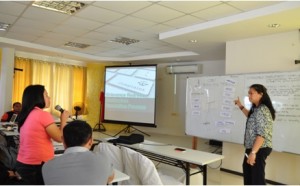 Social and Environmental Safeguards (SES) Specialist from the National Project Coordination Office Enika Hernando (NPCO) clarifies to participants the Grievance Redress Mechanism Resolution Process during the Results-Based Monitoring and Evaluation Retooling cum SES training workshop held on Sept. 22-25, 2015 at Caluwayan, Marabut, Samar.