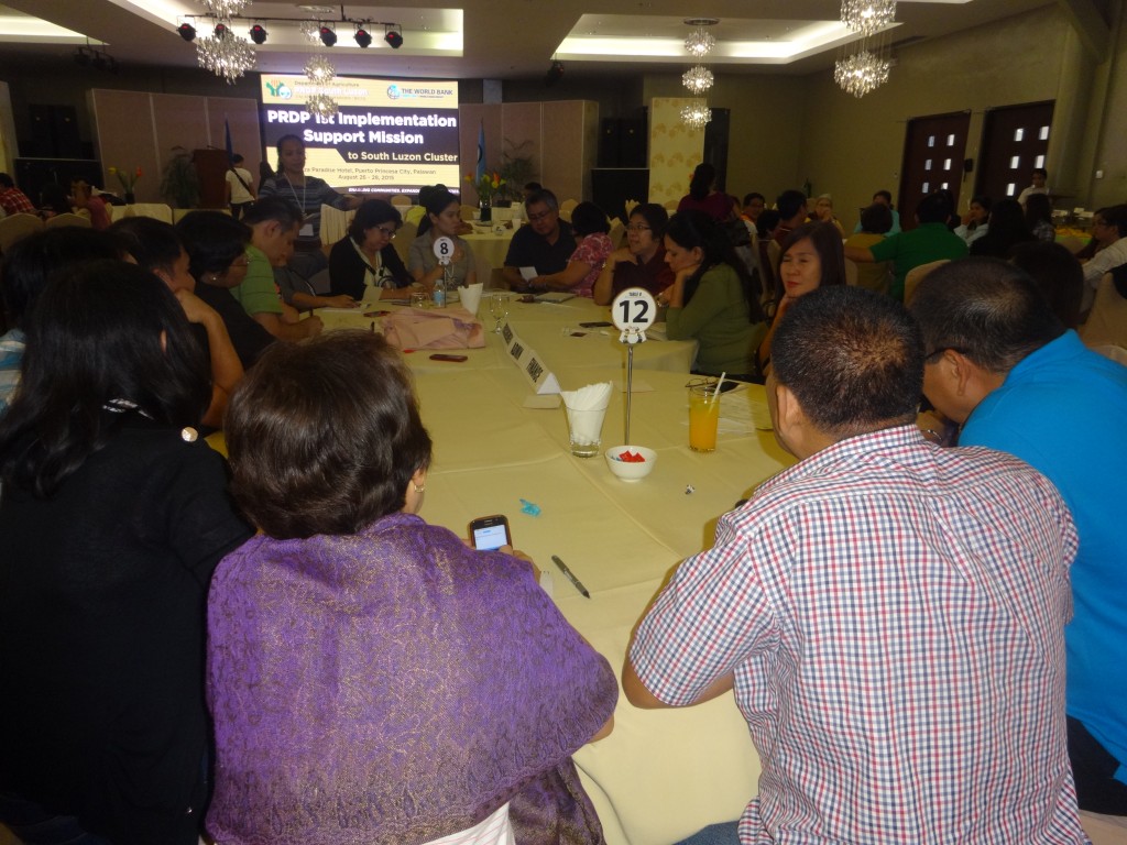  RPCO V Procurement Unit Head Imelda P. Acompañado (seated, 7th from left) joins her counterparts from NPCO, PSO, and RPCOs to share issues and concerns regarding I-SUPPORT implementation during the Workshop with World Bank I-SUPPORT Consultant Luningning Bondoc (5th from right) and HR Consultant Shruti Gaur (4th from right). 