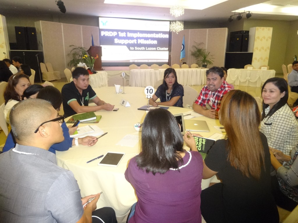 Engr. Eros Jerswin V. Oñate of RPCO V Social and Environmental Safeguards  Unit (5th from left, in black) joins his counterparts from NPCO, PSO, and RPCOs during the Workshop with World Bank Social Safeguards Specialist Jonas Bautista (7th, in checkered polo shirt).