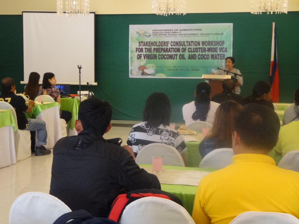 PRDP Bicol I-PLAN Component Head Aloha Gigi I. Bañaria addresses the partici pants of the Stakeholders Consultation Workshop for the Preparation of Clusterwide VCA of Virgin Coconut Oil and Coco Water. The stakeholders’ consultation gathered about 75 input suppliers, coconut farmers, traders, and processors from all provinces of Bicol, except Masbate to map out issues affecting the coconut industry and determine accurate and ideal PRDP interventions to raise coconut farmers’ income. 