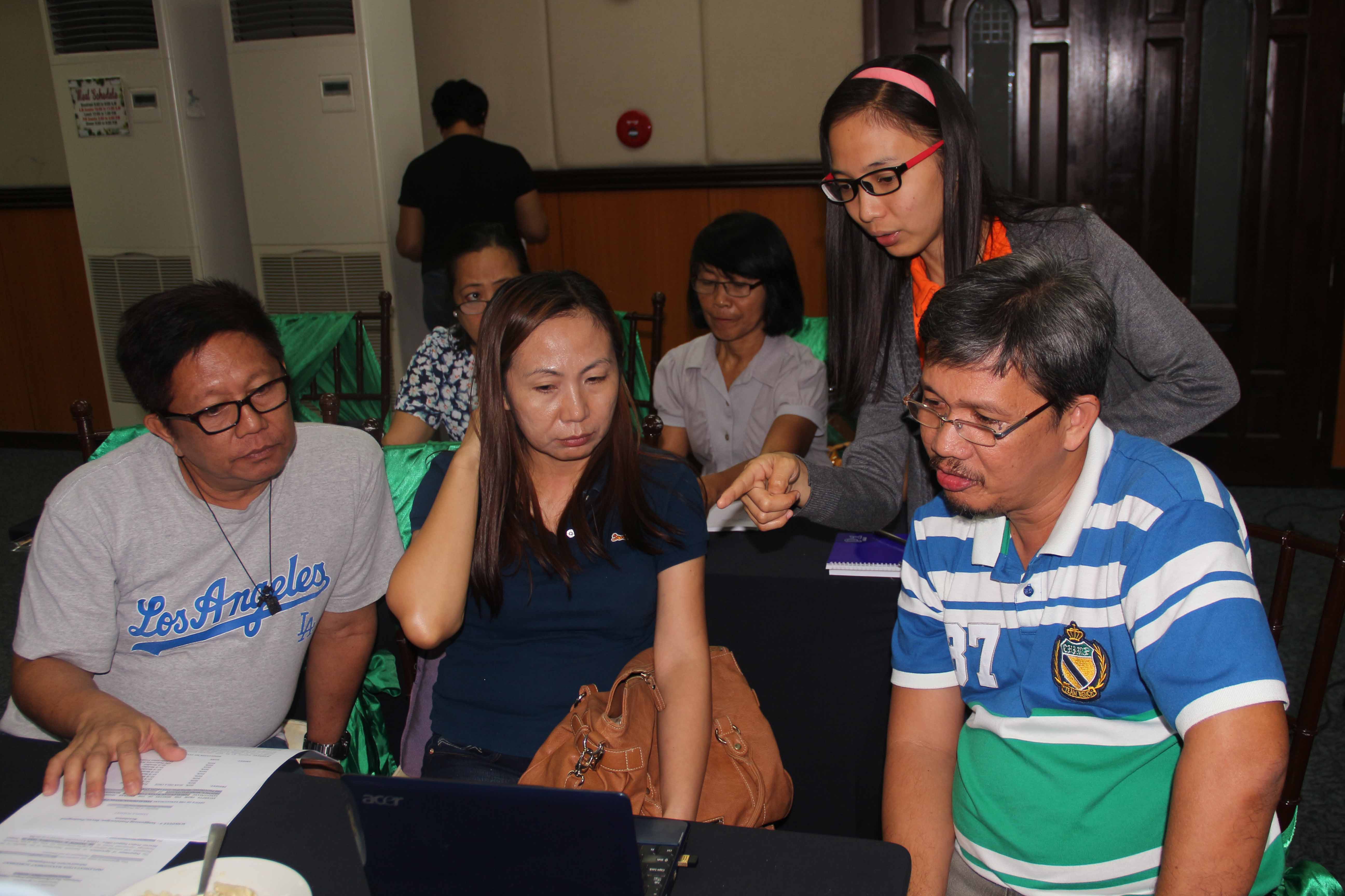 PSO Accountant Angela Baltazar assists the participants in filling-up their IMA.