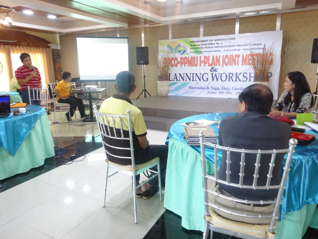 Romeo S. Aquino (in red) of PPMIU-Catanduanes presents the PCIPs for mangrove crab and abaca to the representatives of DA regular programs and partner agencies.