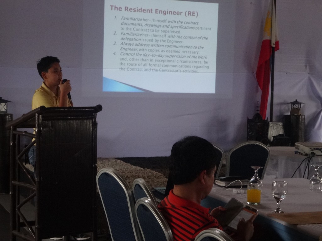 Engr. Rishel B. Peñara of PRDP South Luzon orients the stakeholders of the Upgrading of Manangle-Caima FMR in Sipocot, Camarines Sur about the roles and functions of the resident engineer in the sub-project implementation.