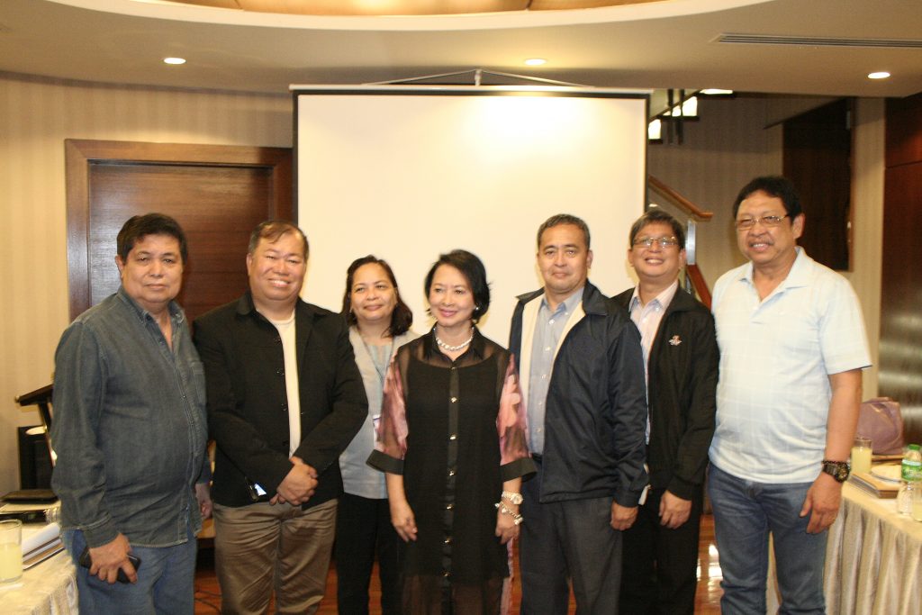 Occidental Mindoro Rep. Josephine Ramirez-Sato (center) poses with the members of the MIMAROPA Regional Project Advisory Board composed of (L-R) Regional Agricultural and Fisheries Council Chairman Melquiades Macalintal, Department of Environment and Natural Resources ARD Vicente Tuddao Jr., Department of Public Works and Highways Representative Engr. Rosa Consolacion Escalada, Department of Interior and Local Government OIC-RED James Fadrilam, Department of Trade and Industry ARD Rodolfo Mariposque, and Department of Agriculture 4B RED Cipriano Santiago. (Photo by Leira Vic Colongon, DA-PRDP RPCO 4B InfoACE Unit)