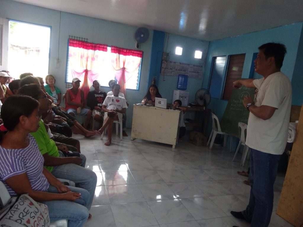 PRDP South Luzon NRM Specialist Ferdinand Cruz enjoins the stakeholders of the Rehabilitation of the Butag Bay Fish Sanctuary and Marine Reserve in Butag, Bulan, Sorsogon to share their insights and support the implementation of the proposal to rehabilitate the marine protected area during a Stakeholders’ Consultation meeting held at the Brgy. Hall of Butag, Bulan, Sorsogon on October 13, 2016. (Photo by Annielyn L. Baleza, DA-PRDP RPCO V InfoACE Unit)