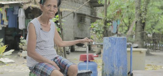 TERESITA PACATE of Barangay Dukay is one of the residents enjoying the potable water supply (PWS) system in their purok. An extension of an existing PWS system from MRDP, the project aims to bring safe and accessible water supply to more households in Esperanza, Sultan Kudarat. Photo by Gian Enrique